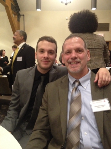 Alumnus Rich Wisniewski with his son at a recent Professional U event.