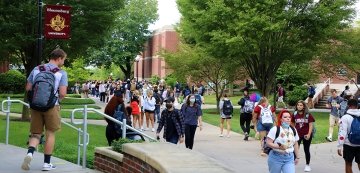 Students move between classes on the first day of the fall semester