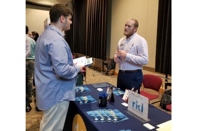 An RKL rep speaks to a student at the last Accounting Expo.